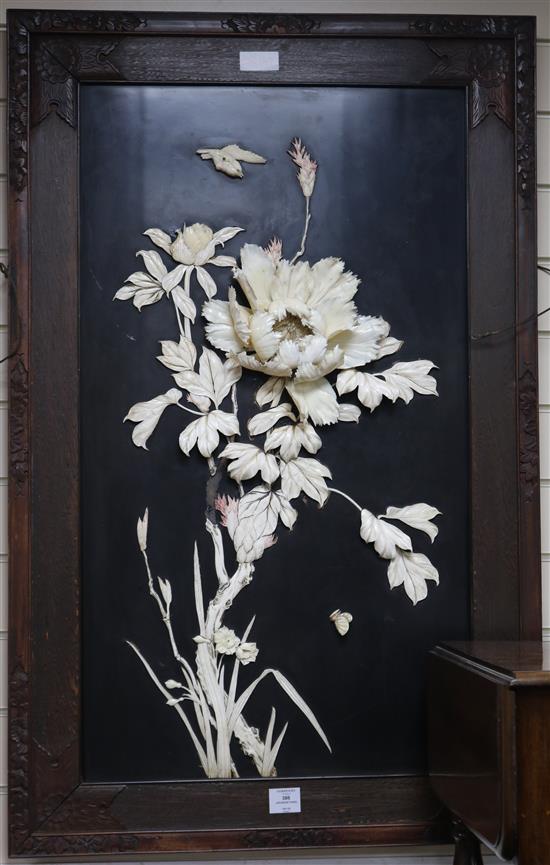 A Japanese panel with carved ivory flowers